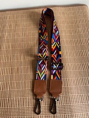 Vibrant Multicolor Geometric Woven Strap with Brown PULeather Tabs